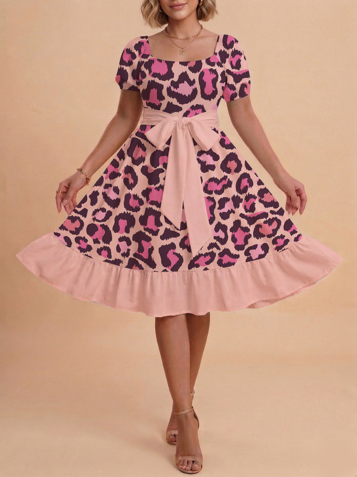 Damen Sommerliches Blumenkleid mit taillierbarem Gürtel und voluminösen Ärmeln Echo Archiv