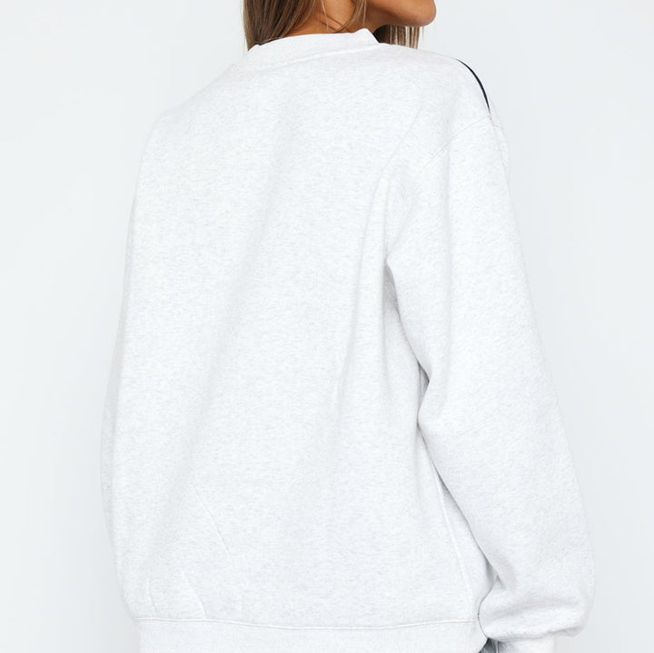 Damen Oversize-Sweatshirt mit kontrastbesetzten Raglanärmeln – Avérine