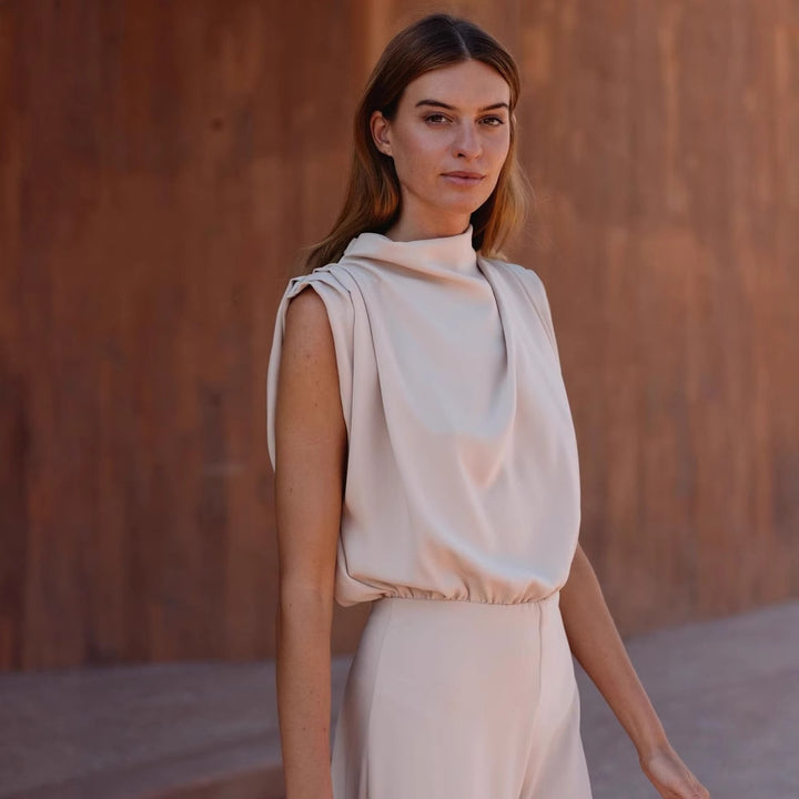 Damen Eleganter Jumpsuit mit hochgeschlossenem Kragen und weiten Beinen Echo Archiv