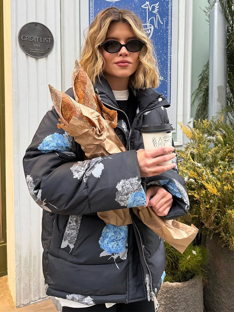 Damen Gepolsterte Oversize-Steppjacke mit Blumenprint und Kapuze Echoarchiv