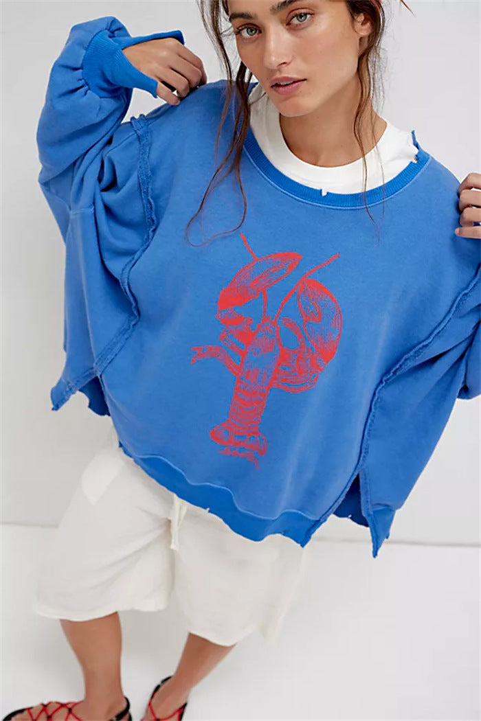 Damen oversized Sweatshirt mit Rüben-Print, ausgefransten Nahtakzenten und Daumenlochärmeln – Avérine