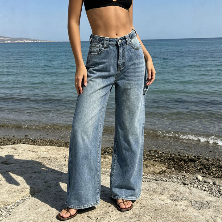Damen nan weite High‑Waist Carpenter-Denimhose mit Utility-Seitentasche und ausgestelltem Bein Echo Archiv