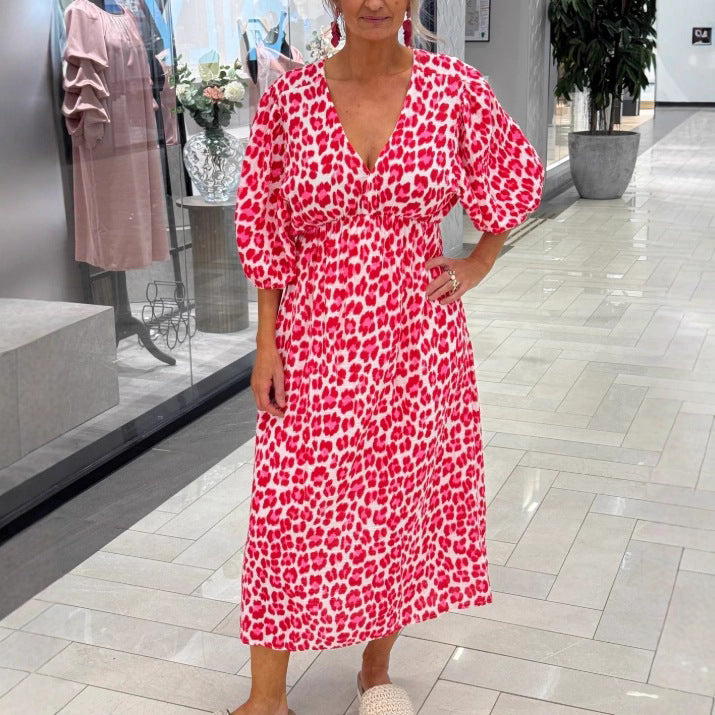 Damen nan Maxikleid mit tiefem V-Ausschnitt, voluminösen Puffärmeln und smockierter Taillennaht Echo Archiv