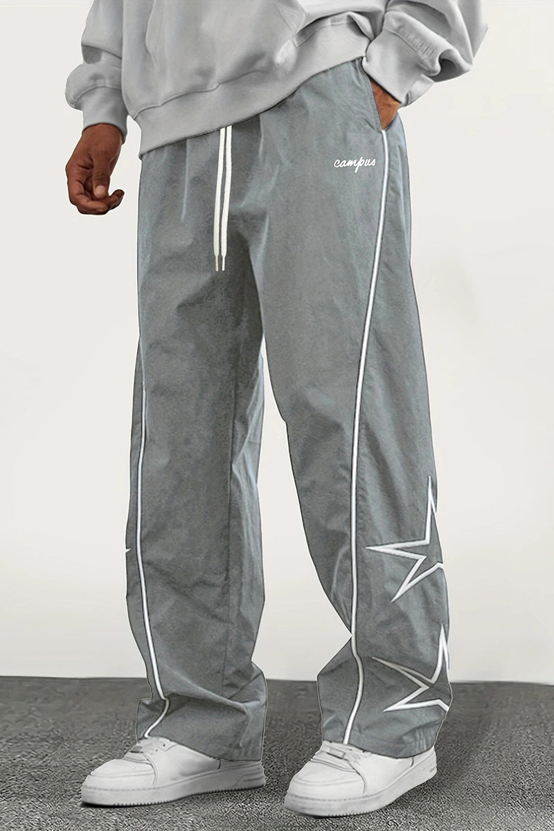 Herren Weite Trackpants mit Kontrastpaspel, Kordelzug und Sternapplikation Echo Archiv