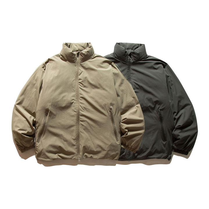 Herren Kurzblouson mit leichter Thermowattierung, hohem Stehkragen und elastischen Bündchen Echoarchiv