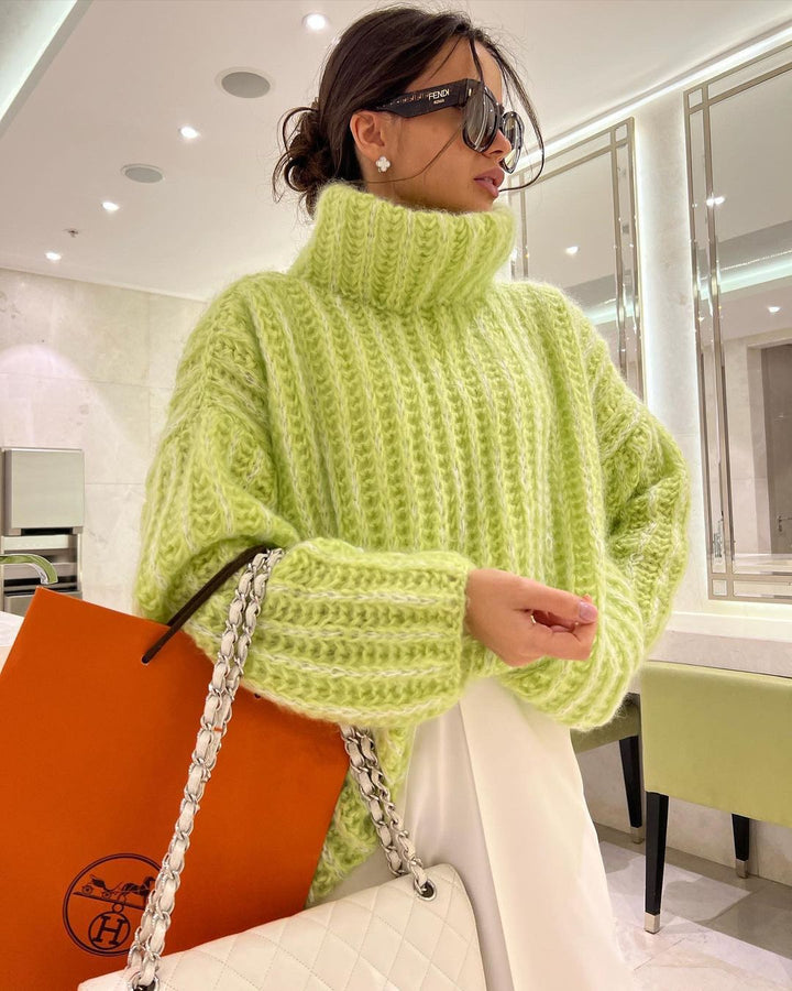 Damen Oversized Grobstrick-Rollkragenpullover mit voluminösen Ärmeln Echoarchiv