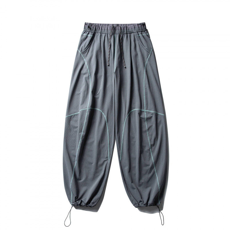 Unisex Locker geschnittene Tech-Jogginghose mit elastischem Bund, markanten Flatlock-Nähten und Kordelzug Echo Archiv