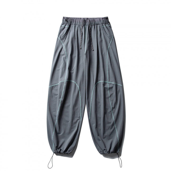 Unisex Locker geschnittene Tech-Jogginghose mit elastischem Bund, markanten Flatlock-Nähten und Kordelzug Echo Archiv