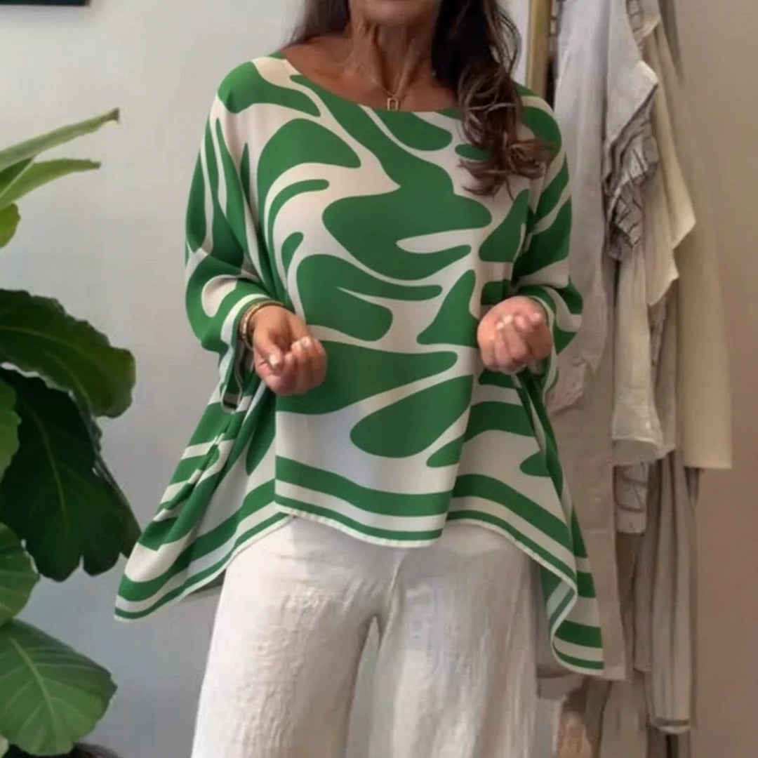 Damen Oversize Sommerbluse mit abstraktem Print, Fledermausärmeln und asymmetrischem Saum – Élovi