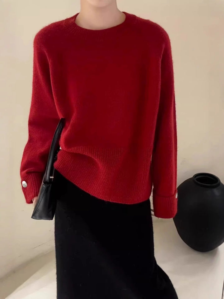 Damen Oversize-Rundhalspullover mit verlängerten Manschetten und Zierknopf Echoarchiv