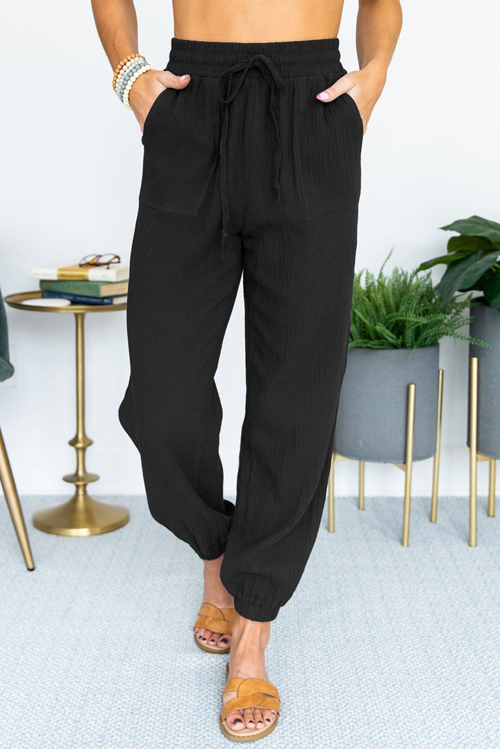 Damen Leichte Leinen-Joggerhose mit Tunnelzug, aufgesetzten Taschen und elastischen Bündchen Echo Archiv