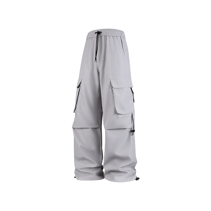 Herren Baggy‑Cargohose im Tech‑Utility‑Stil mit elastischem Tunnelzugbund, großen Klappfächern und Zipper‑Details Echo Archiv