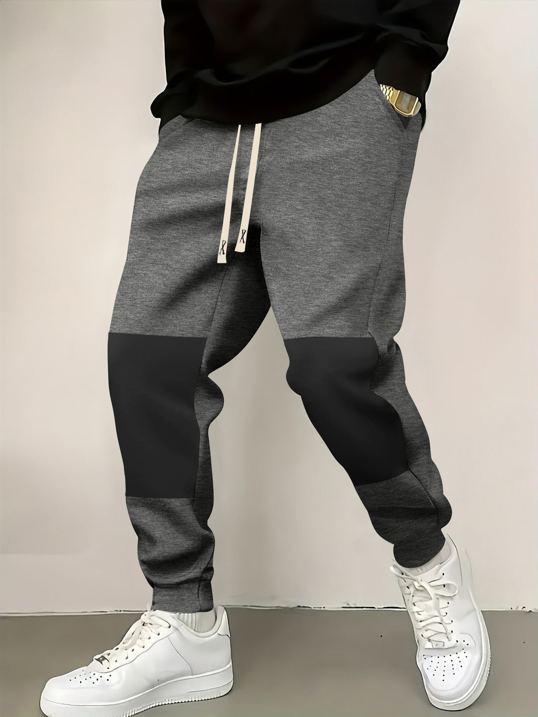 Herren elegante Sporthose mit modernen Farbblockelementen Echoarchiv