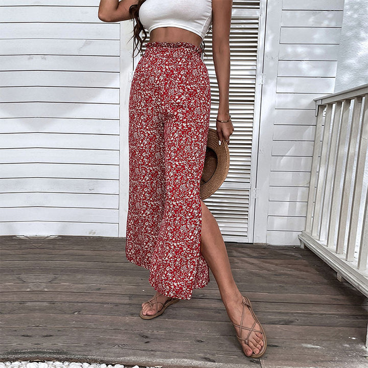 Damen Weite hochgeschnittene Palazzo‑Hose mit floralem Muster und seitlichem Beinschlitz Echoarchiv