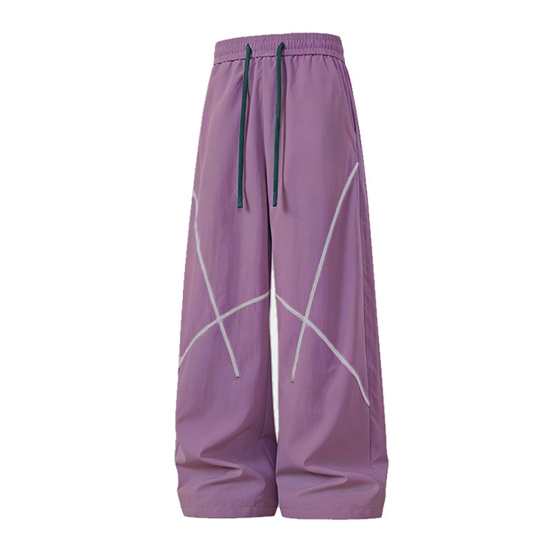 Herren Weite Funktions-Nylonhose mit Kordelbund, reflektierenden Nahtdetails & lässiger Baggy‑Silhouette Echoarchiv