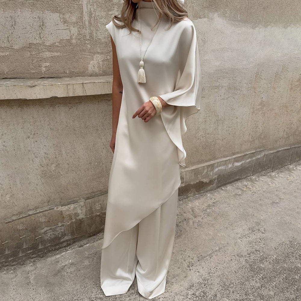 Damen Elegantes asymmetrisches Kleid mit hohem Kragen und seitlichem Schwung Echo Archiv