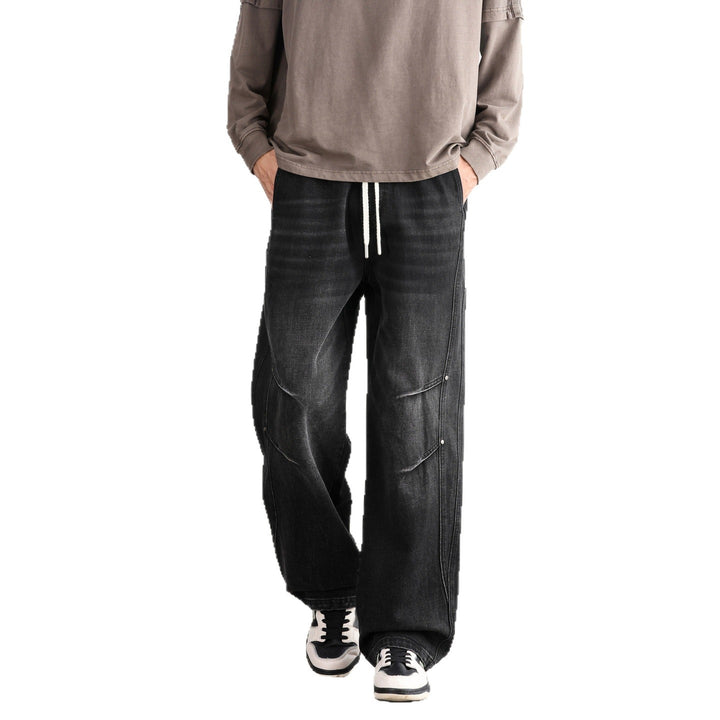 Herren Weite Denim-Hose mit Tunnelzugbund, Paneelnähten und Used-Waschung Echo Archiv