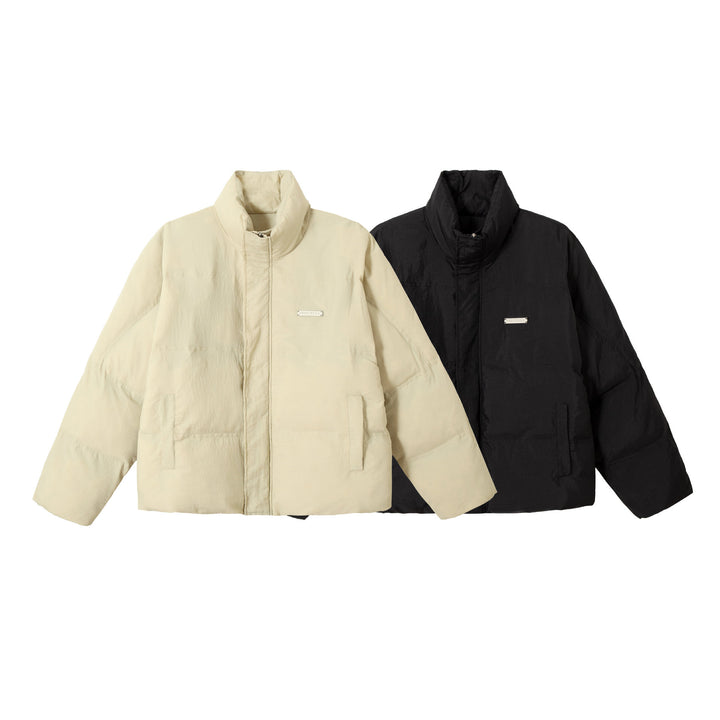 Unisex Boxy-Pufferblouson mit hohem Stehkragen und verdeckter Frontblende Echoarchiv