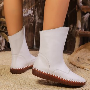 Damen nan knöchelhohe Stretch-Stiefelette mit handgenähter Mokassinnaht und profilierter Leichtlaufsohle Echo Archiv