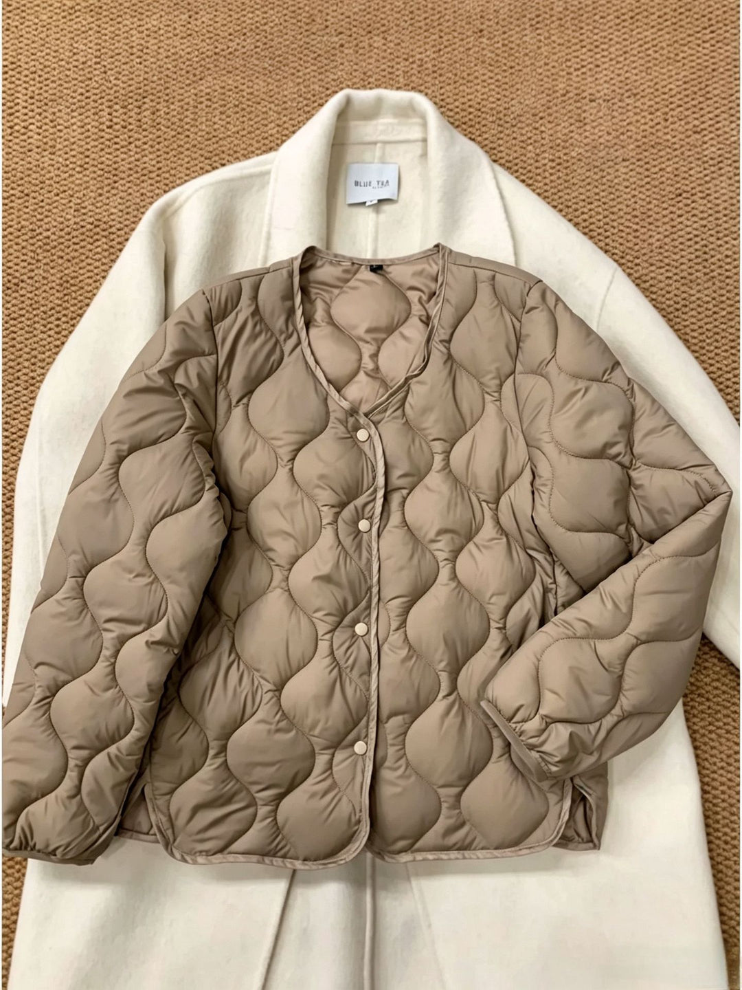 Damen Modische Daunenjacke Echoarchiv