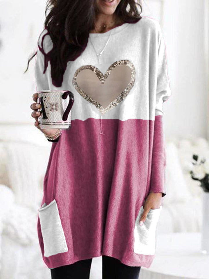 Damen Oversized Lange Pullover Tunika mit Pailletten-Herz und aufgesetzten Taschen Echoarchiv