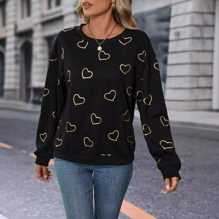 Damen nan lockeres Herzprint-Sweatshirt mit Rundhalsausschnitt und Rippbündchen Echo Archiv