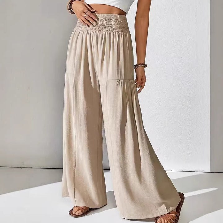 Damen weite Palazzo-Hose mit gerafftem Smock-Bund und Stufendetails – Avélisse