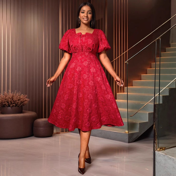 Damen Midikleid mit schwingendem Rock und floralen Mustern Echo Archiv