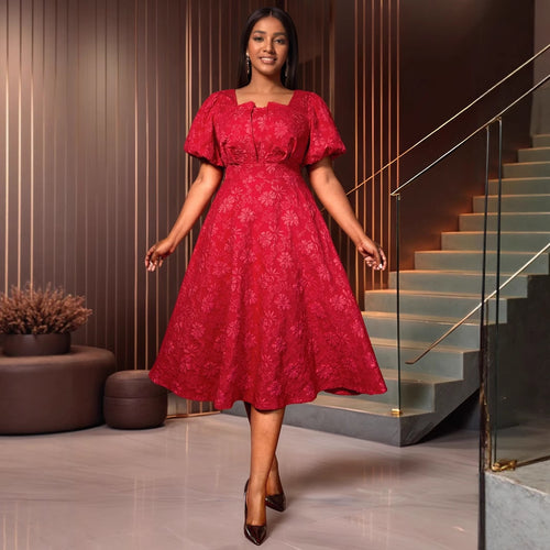 Damen Midikleid mit schwingendem Rock und floralen Mustern Echo Archiv