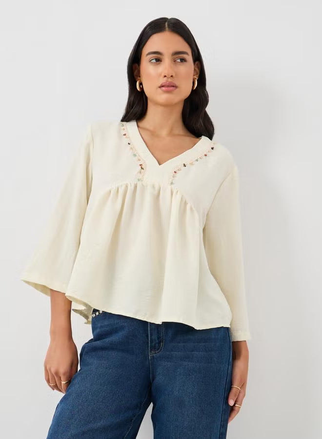 Damen Lockere Bluse mit eingearbeiteten Details Echo Archiv