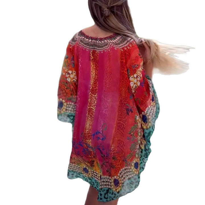 Damen nan kurzes Tunika-Kaftan mit verziertem V-Ausschnitt und floral-animalischer Bordüre Echo Archiv