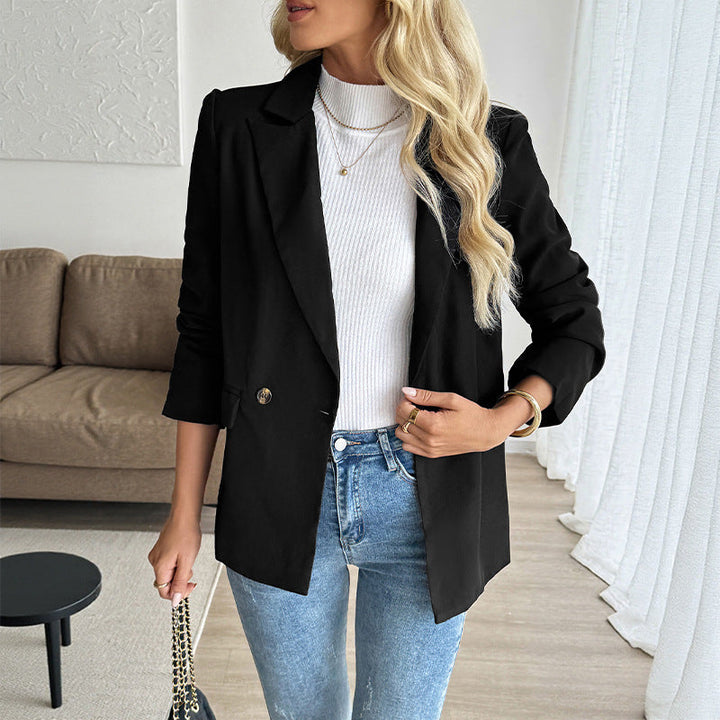 Damen Figurschmeichelnder Longblazer mit eingesetztem Knopf, gerollten Ärmeln und Pattentaschen Echoarchiv