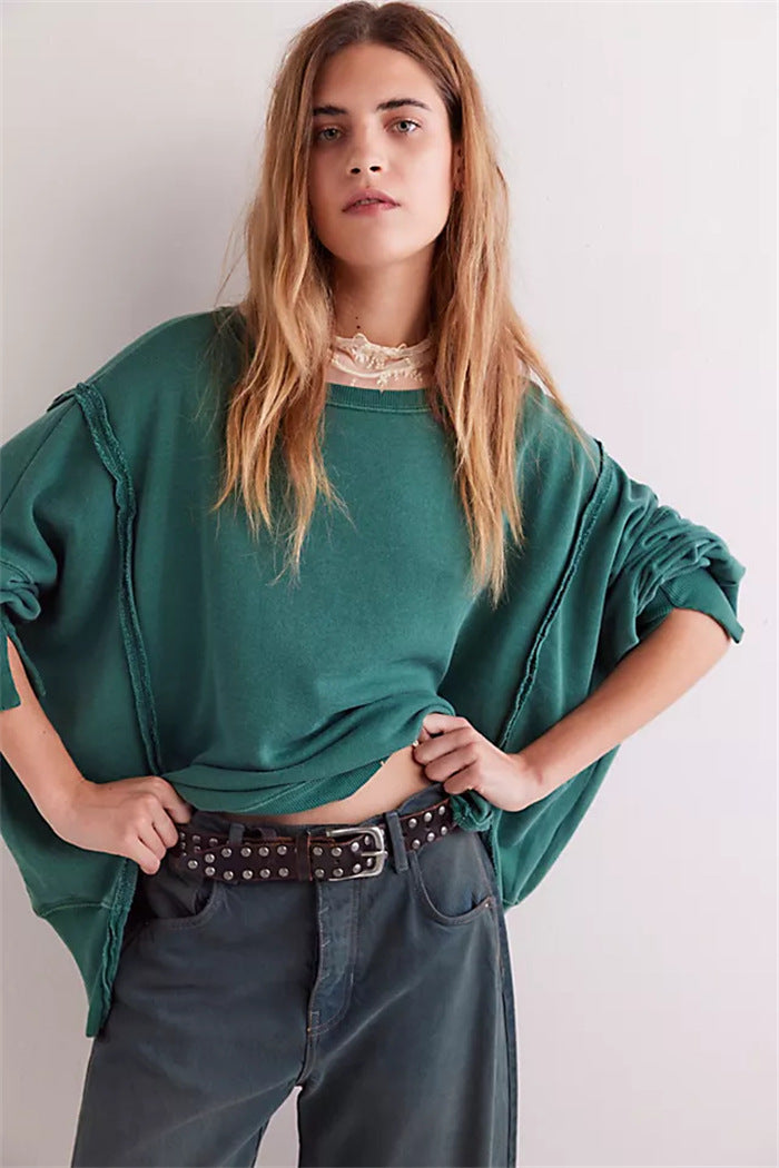 Damen oversized Sweatshirt mit Ballonärmeln, offenen Saumnähten und seitlichen Schlitzen – Avérine