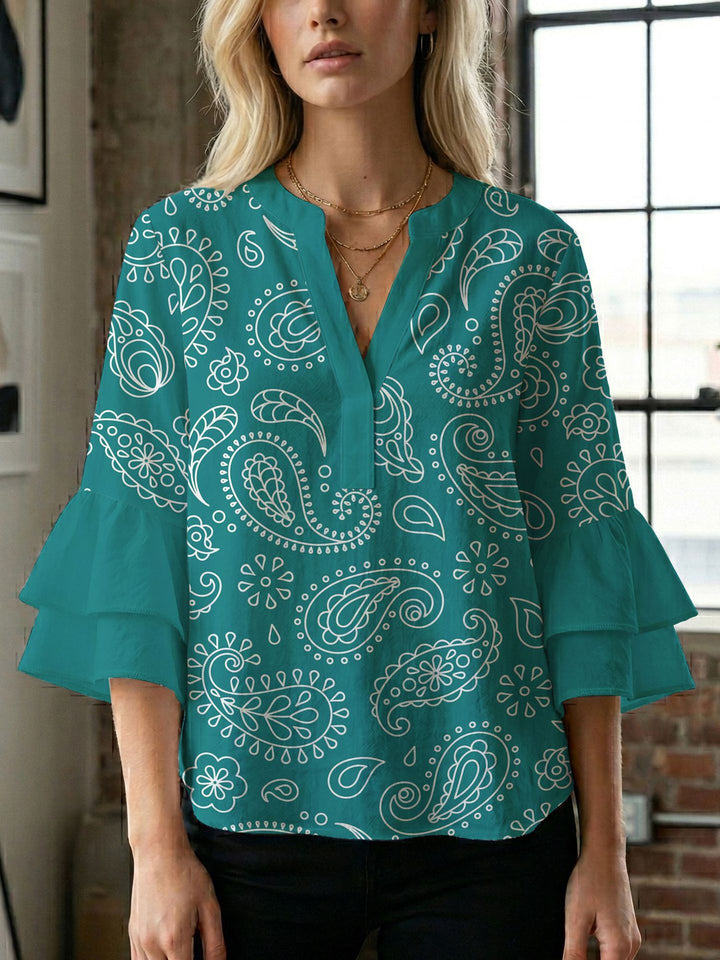 Damen Bluse mit voluminösen Flügelärmel und intensivem Blattmuster Echo Archiv