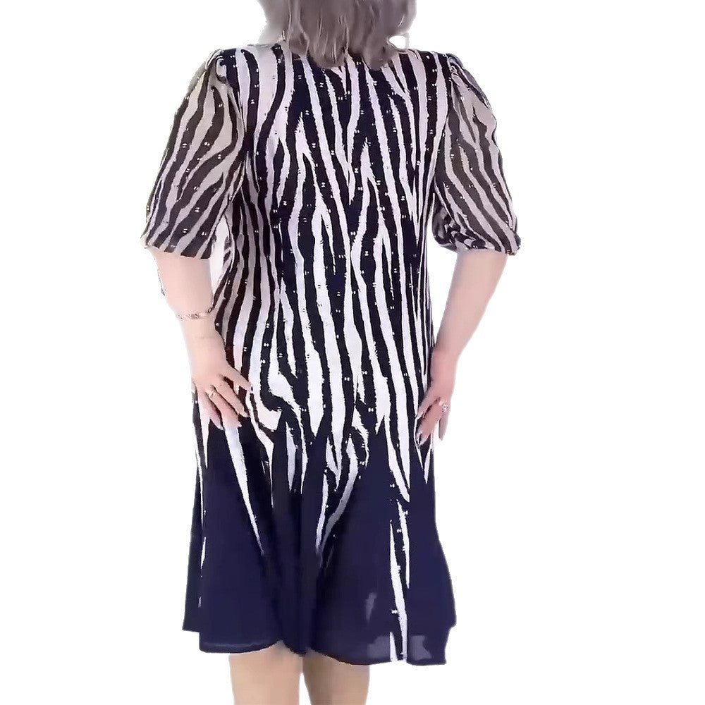 Damen nan tailliertes Midikleid mit grafischem Animalmuster, transparenten Puffärmeln und schwingendem Faltenrock Echo Archiv