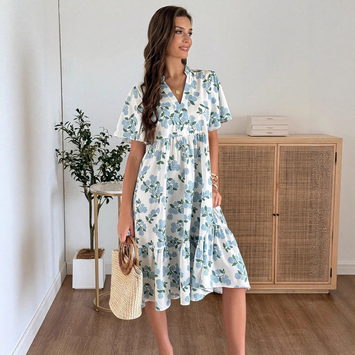 Damen Midikleid mit frischem Blumenmuster und voluminösem Rock Echo Archiv