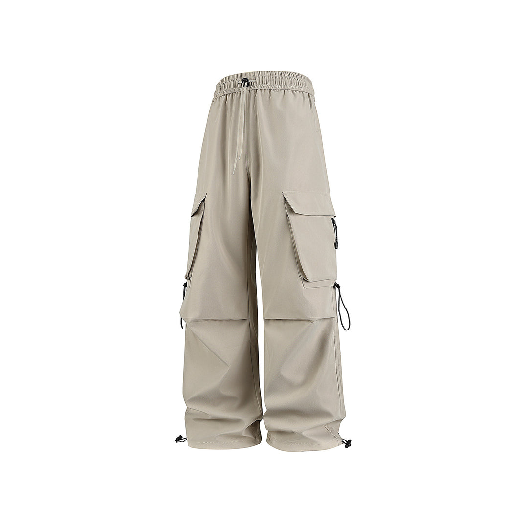 Herren Baggy‑Cargohose im Tech‑Utility‑Stil mit elastischem Tunnelzugbund, großen Klappfächern und Zipper‑Details Echo Archiv