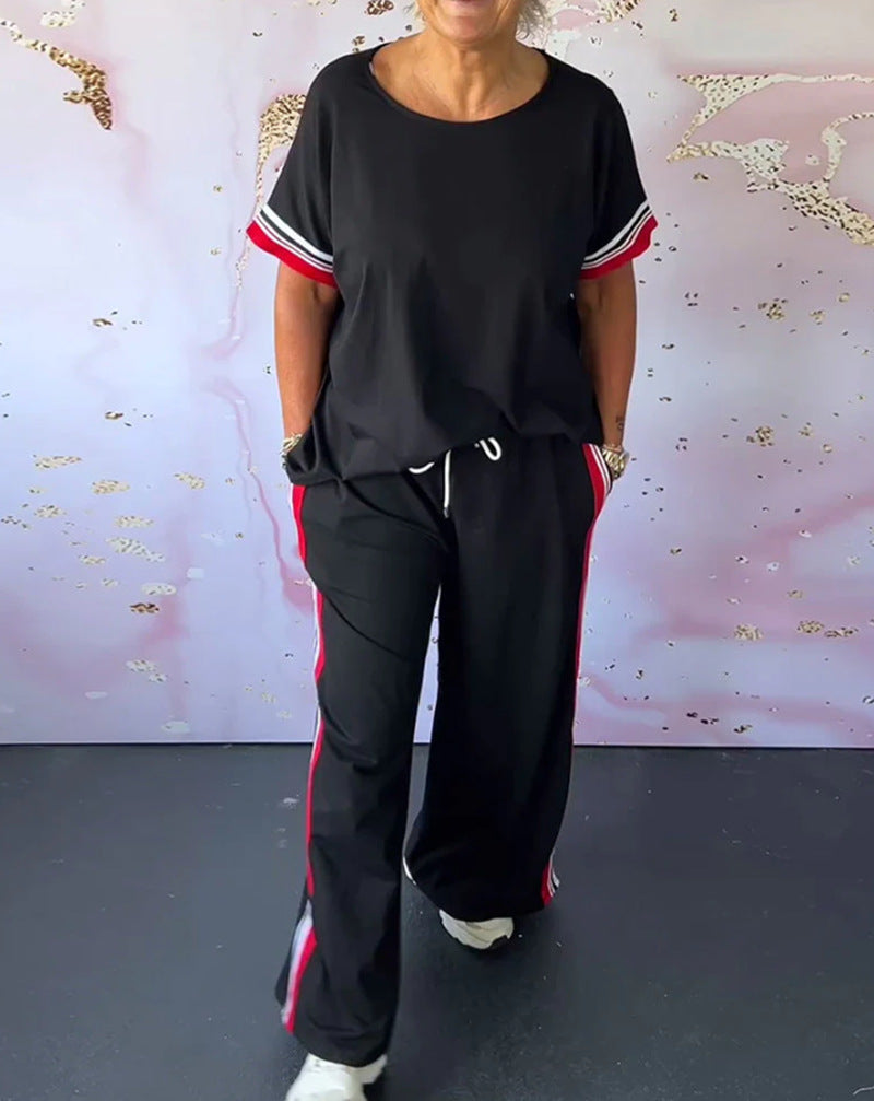 Damen nan sportlich-eleganter Zweiteiler mit kastigem Kurzarmshirt, Tunnelzug-Jogpant und seitlichem Kontraststreifen Echo Archiv