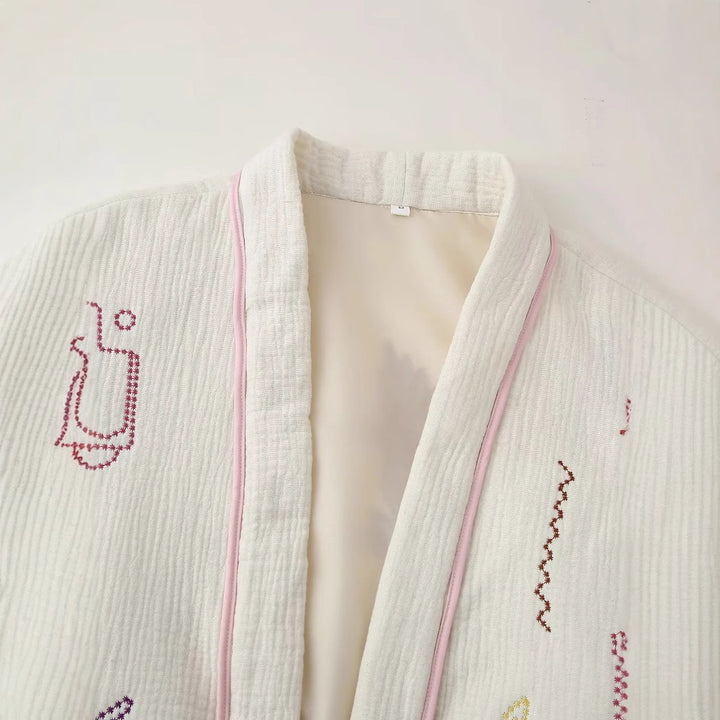 Damen gesteppte Kimono-Jacke mit dekorativer Stickerei, aufgesetzten Taschen und lässigem Oversize-Schnitt – Célinea