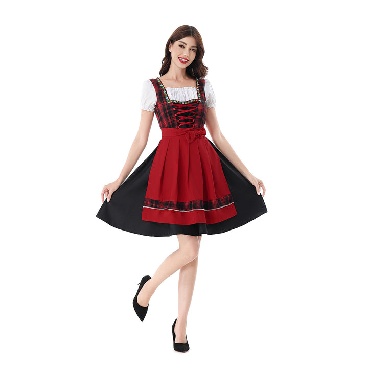 Damen nan traditionelles Dirndlkleid mit kariertem Mieder, Schnürung, Puffärmeln und Schürze Echo Archiv