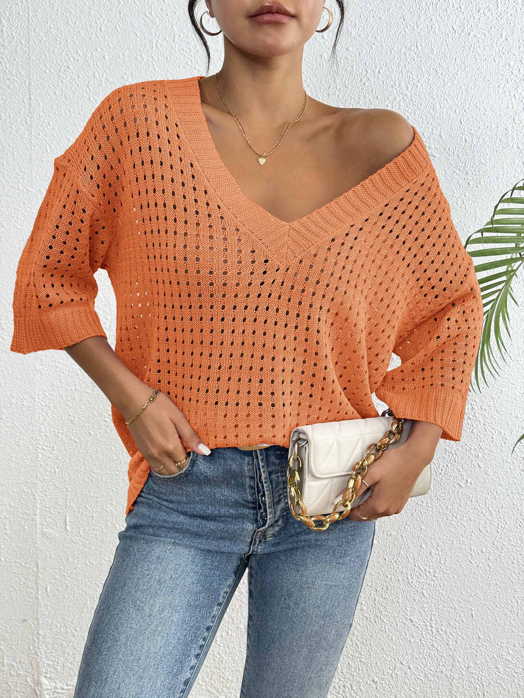 Damen luftiger Strickpullover mit V-Ausschnitt und dekorativem Lochmuster Echo Archiv