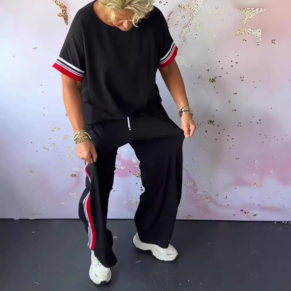 Damen nan sportlich-eleganter Zweiteiler mit kastigem Kurzarmshirt, Tunnelzug-Jogpant und seitlichem Kontraststreifen Echo Archiv