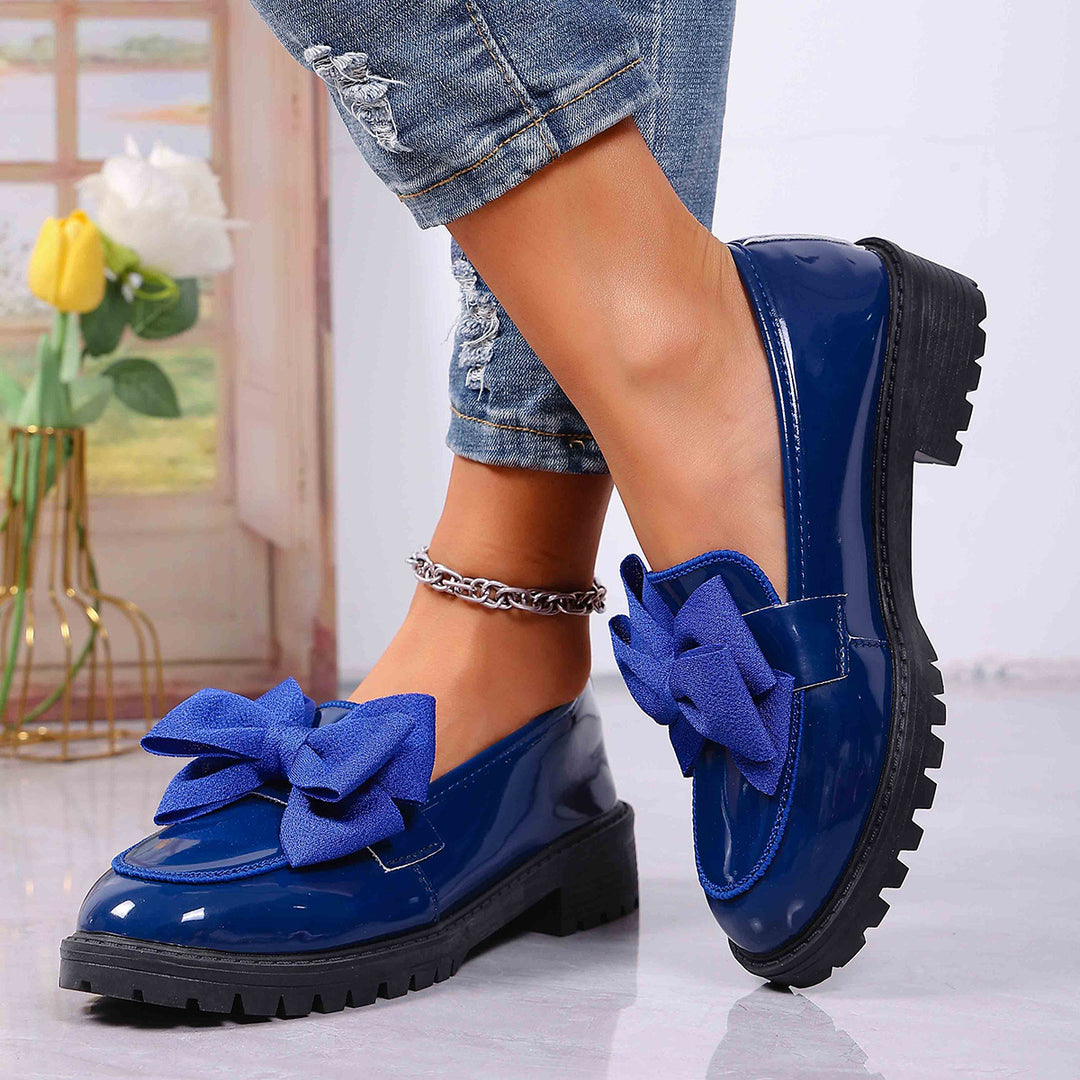 Damen Plateau-Loafer aus Lackimitat mit profilierter Gummisohle und Zierschleife – Lioré