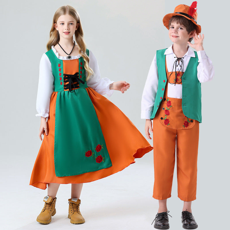 Damen nan folkloristisches Kinderdirndl mit geschnürtem Mieder und bestickter Schürze Echo Archiv