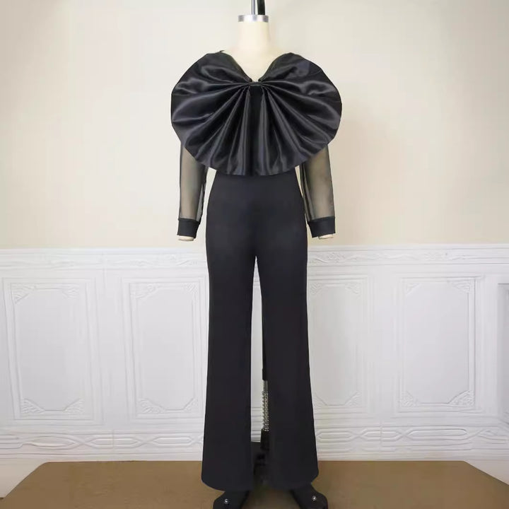 Damen eleganter Jumpsuit mit voluminösem Satinkragen und transparenten Ärmeln Echo Archiv