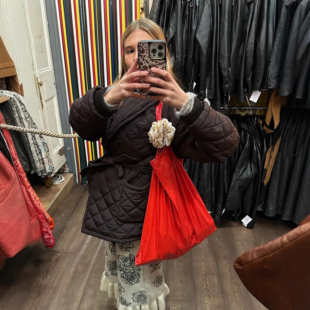 Damen Wickel-Steppjacke mit Taillenbindegürtel und Schalkragen Echoarchiv