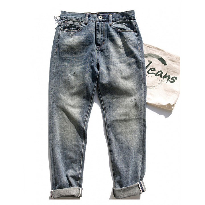 Herren Relaxed-Tapered Vintage-Jeans mit Used‑Effekt und aufgekrempeltem Saum Echoarchiv