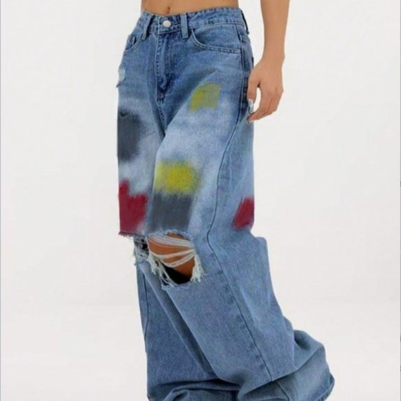 Damen weite Denim-Jeans mit Paint‑Splatter und Distressed-Knie Echo Archiv