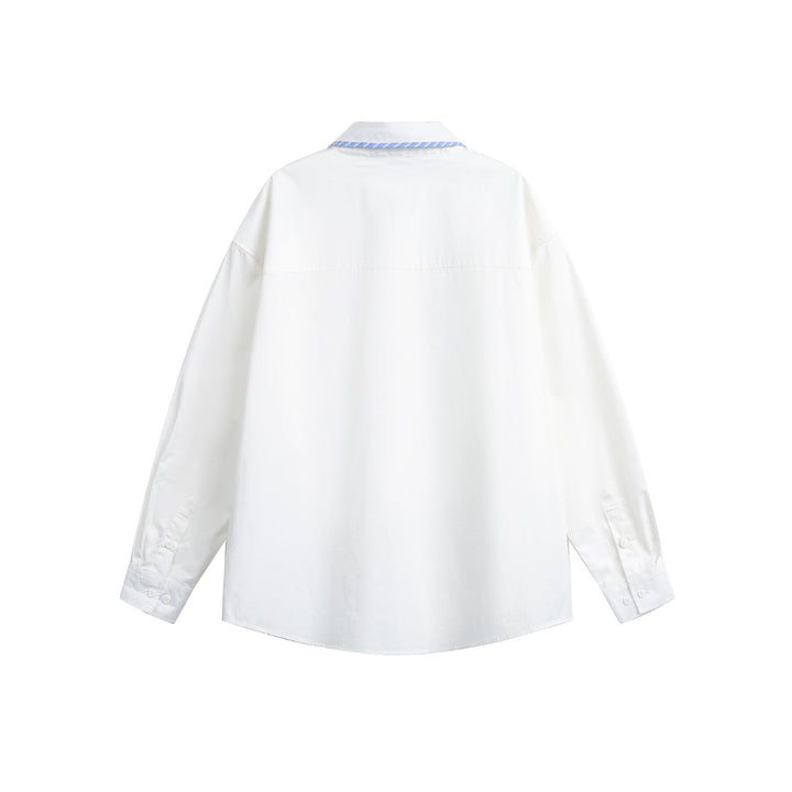 Unisex Oversize-Hemdjacke mit gestreifter Paspelierung am Kragen und durchgehender Knopfleiste Echoarchiv