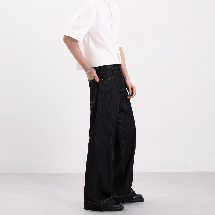Herren Oversize-Denim-Palazzohose mit skulpturalen Paneelnähten und tiefem Schritt Echo Archiv